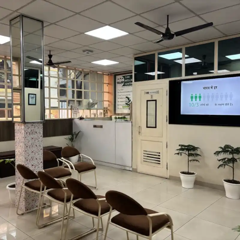 Reception and patient waiting area of Cure Wellness holistic wellness centre in Meerut.